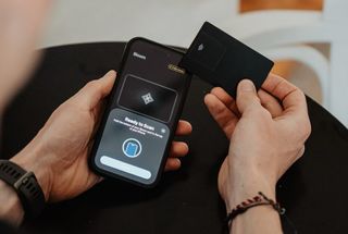 Tapping the bloom card with the Bloom app installed on an iPhone