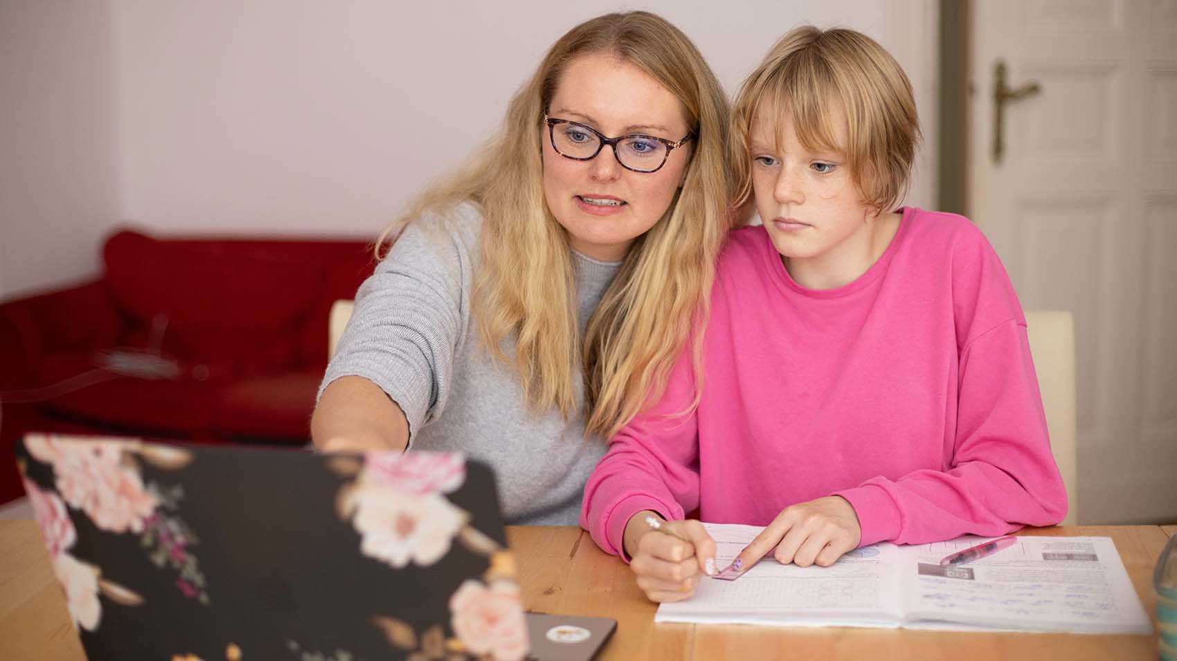 mother homeschooling daughter