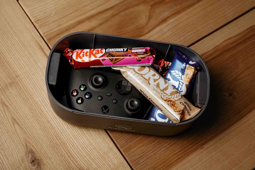 Snacks and Xbox remote in timed lock box