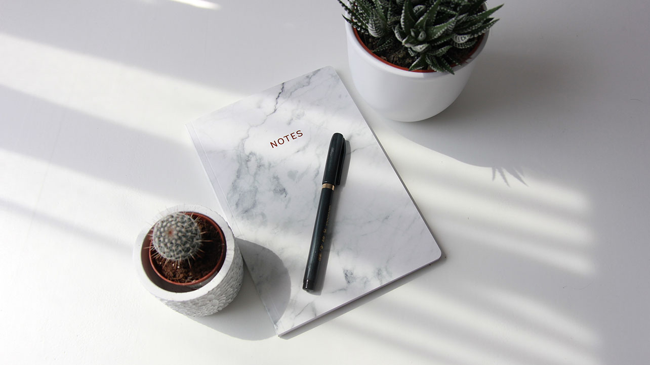 a notebook that serves for the minimalist morning routine journaling