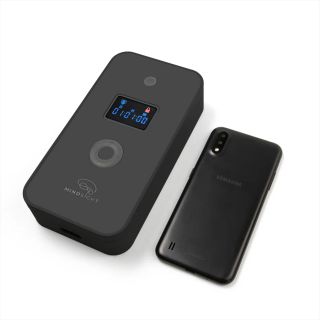 Mindsight Phone Lock Box next to a phone